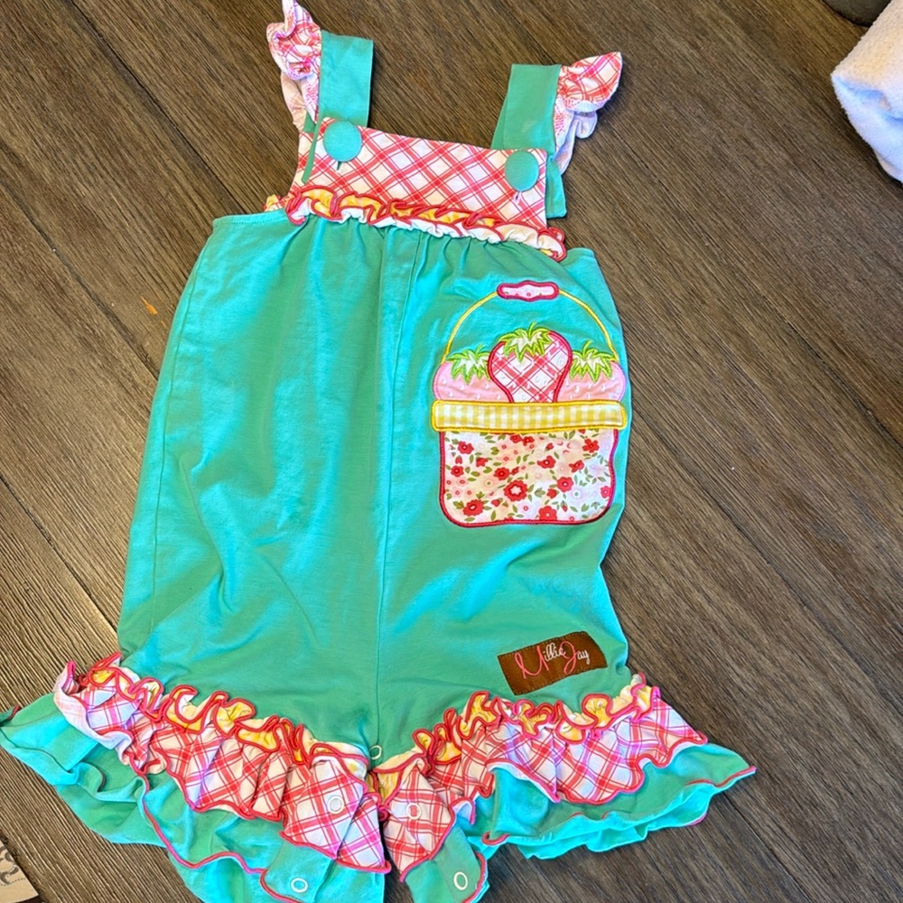 0005 Millie Jay body suit 12m